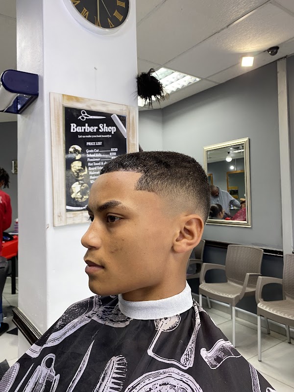 Clean fade and taper haircut result